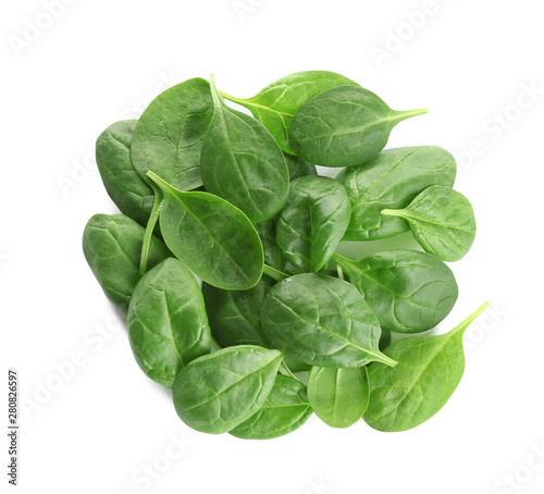 Pile of fresh green healthy baby spinach leaves on white background, top view