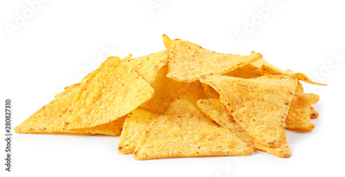 Pile of tasty Mexican nachos chips on white background