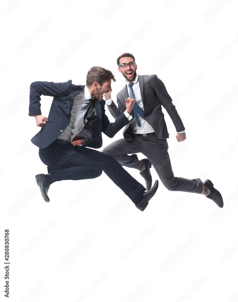 in full growth. two cheerful dancing business people in full growth. two cheerful dancing business people