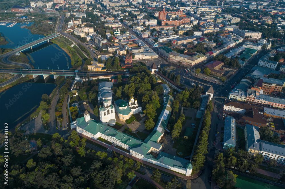 Fototapeta premium The Transfiguration Monastery in the cityscape on a sunny July morning (aerial photography). Yaroslavl, Golden Ring of Russia