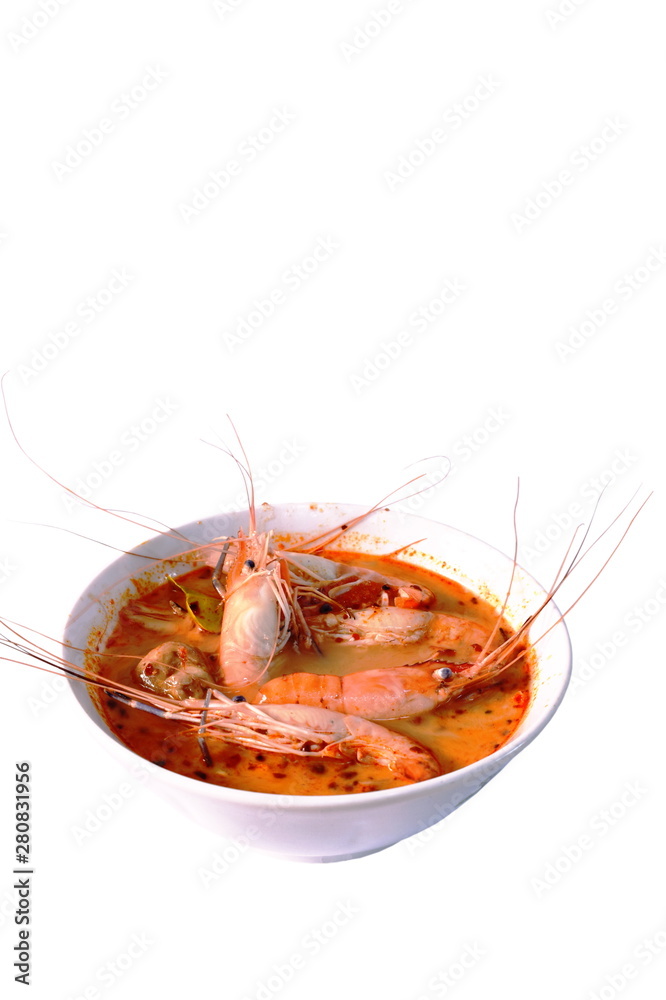 boiled shrimp with herb in Thai spicy soup or tom yum kung on bowl boiled shrimp with herb in Thai spicy soup or tom yum kung on bowl