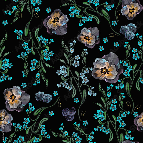 Embroidery pansies flowers and meadows floral herbs seamless pattern. Botanical fashion template for clothes, textiles, t-shirt design