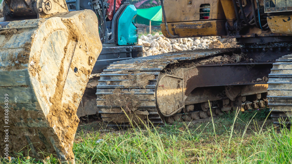 Fototapeta premium Huge excavator park on construction work site