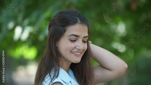 Wallpaper Mural Beautiful girl smartening up and turning her head around with a smile in slo-mo Torontodigital.ca