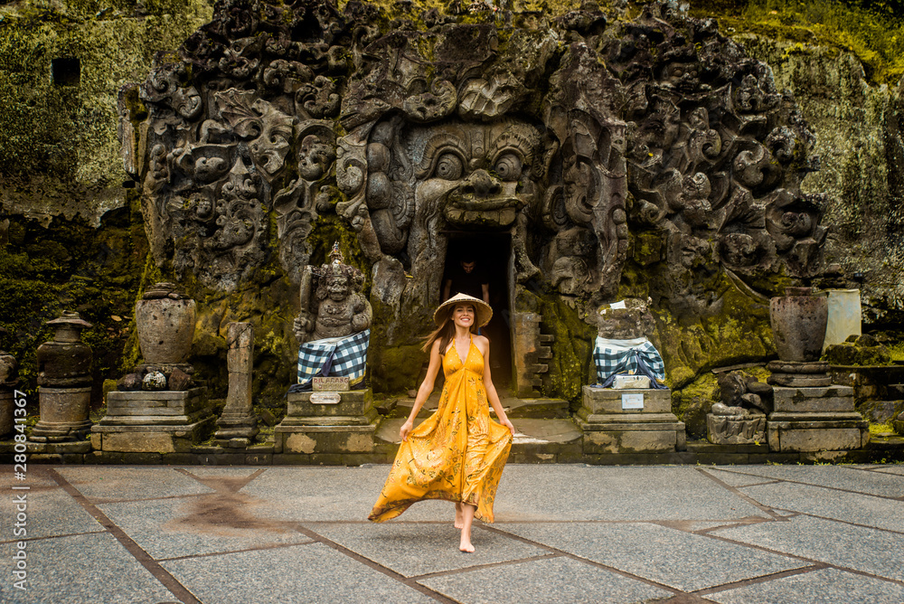 Pretty girl at Goa Gajah, Bali - obrazy, fototapety, plakaty 