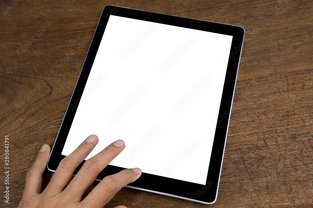 Close up hand holds smart phone with black isolated screen over wooden background Close up hand holds smart phone with black isolated screen over wooden background