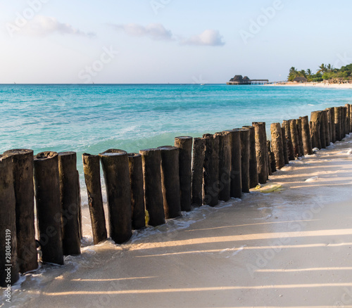 wooden fence in ocean