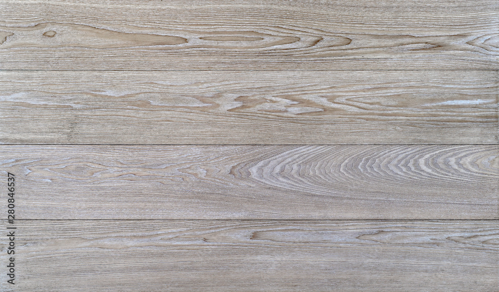 Fototapeta premium Whitened wooden boards. Ash tree texture. Table top or floor surface, top view. Template for flat lay design. Copy space. 