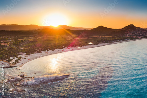 Sunset on Costa Rei with Scoglio di Peppino, Sardinia, Italy photo