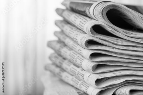 Newspapers folded stack, the concept of world news photo