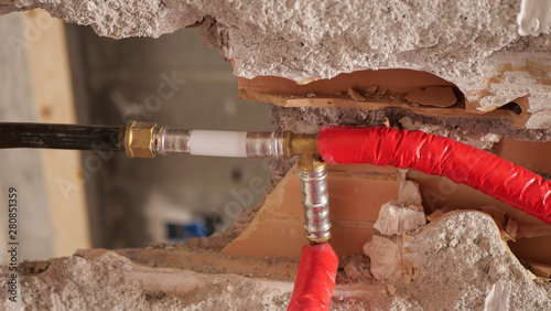 repair of apartments, heating pipe closeup. neighbors flooded photo