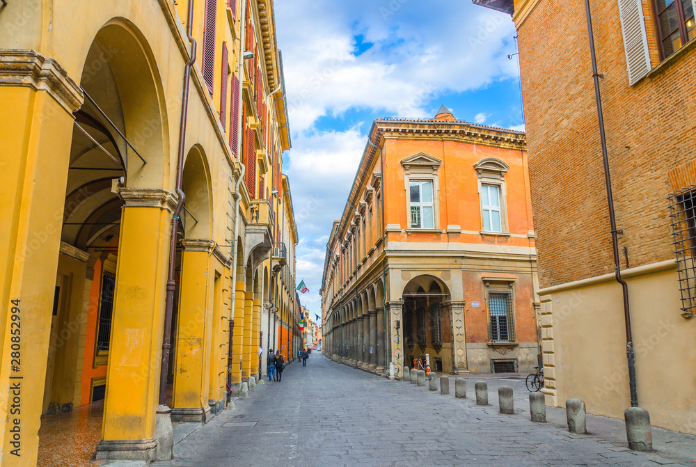 Typical italian street, buildings with columns, Palazzo Paleotti, Palazzo Gotti palace, Since Academy, University of Bologna in old historical city centre of Bologna, Emilia-Romagna, Italy