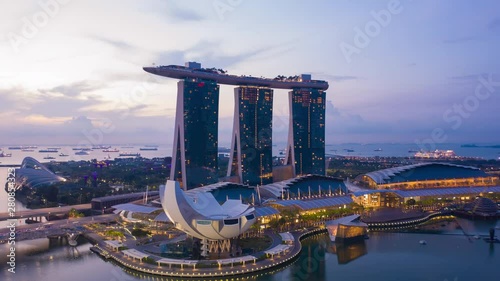 aerial view hyperlapse 4k video of the Marina Bay Sands in Singapore City Skyline. photo