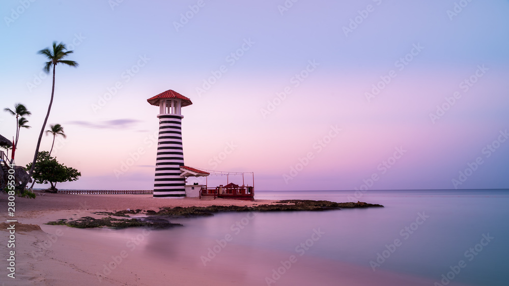 Sunrise at Bayahibe beach with smooth water, La Romana, Dominican republic - obrazy, fototapety, plakaty 