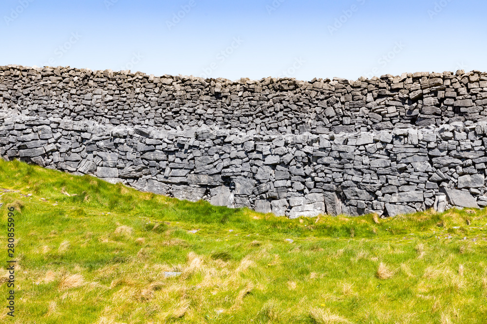 Rock walls from ancient fort ruins in in Inishmore