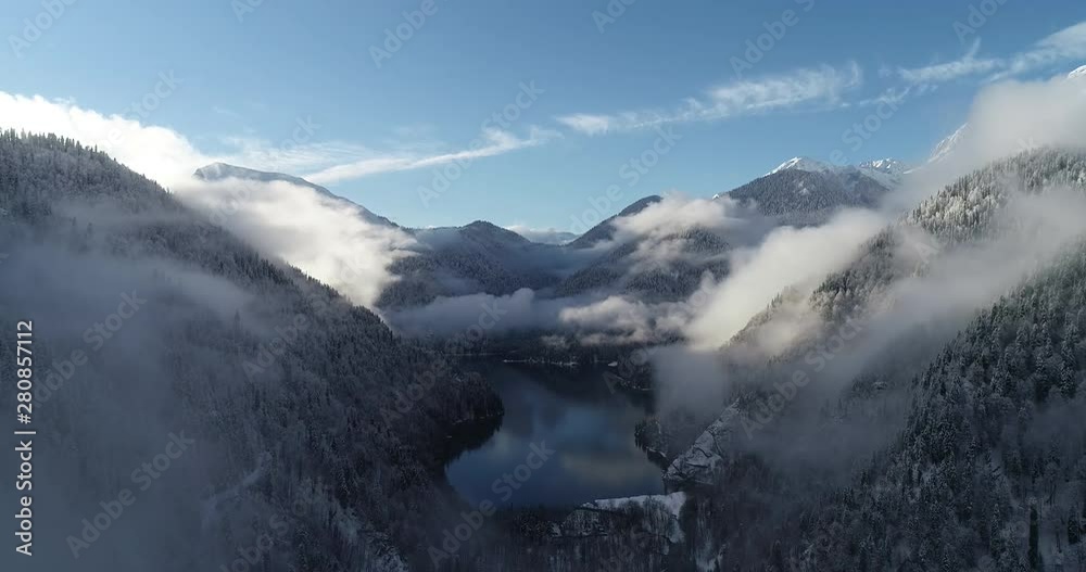 Lake Ritsa in the New Year holidays in January in the mountains of Abkhazia (Georgia) A series of unique source videos in 4K filmed by a professional drone from a winter trip Lake Ritsa in the New Year holidays in January in the mountains of Abkhazia (Georgia) A series of unique source videos in 4K filmed by a professional drone from a winter trip