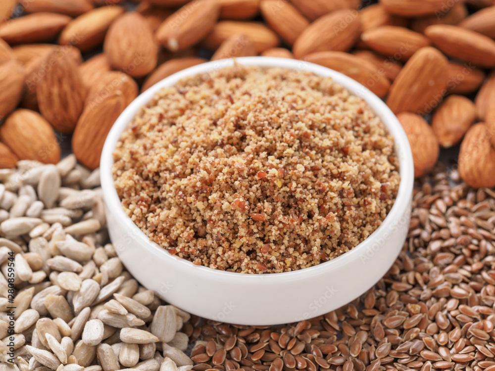 Homemade LSA mix in plate - Linseed or flax seeds, Sunflower seeds and Almonds. Traditional Australian blend of ground, source of dietary fiber, protein, omega fatty acids. Copy space for text. Homemade LSA mix in plate - Linseed or flax seeds, Sunflower seeds and Almonds. Traditional Australian blend of ground, source of dietary fiber, protein, omega fatty acids. Copy space for text.