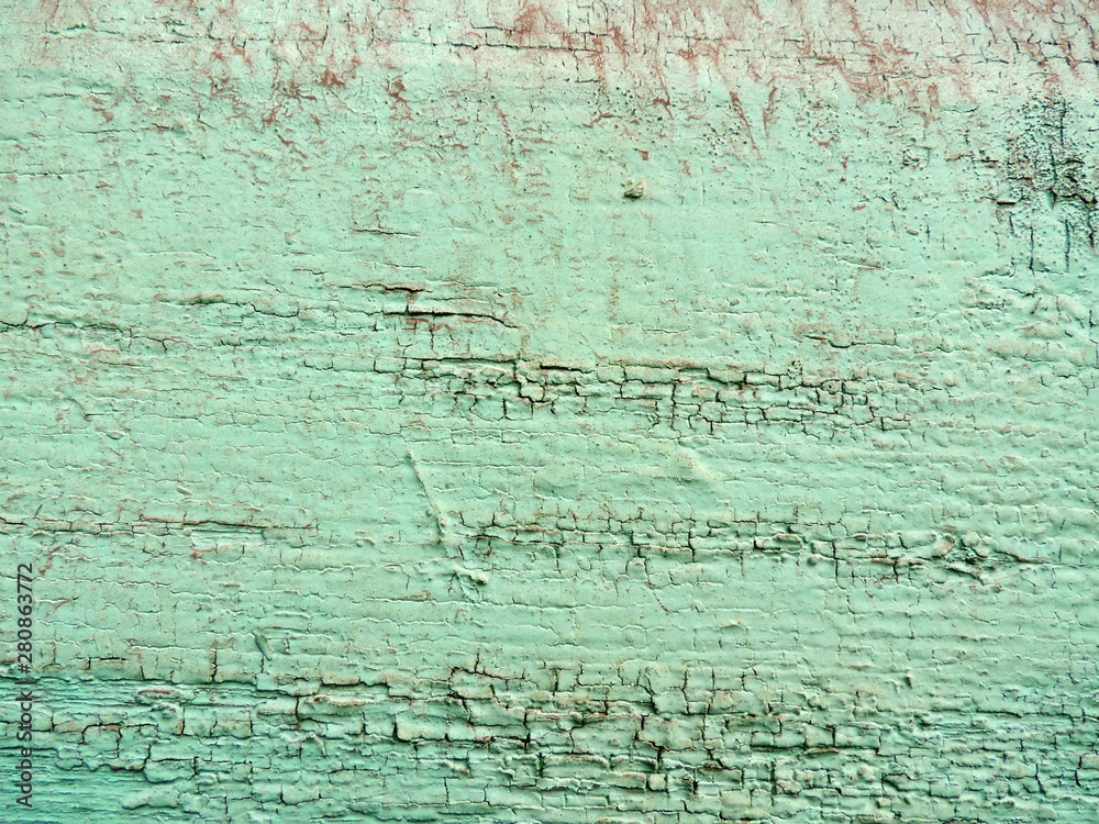 the background is covered with a layer of weathered turquoise paint the background is covered with a layer of weathered turquoise paint