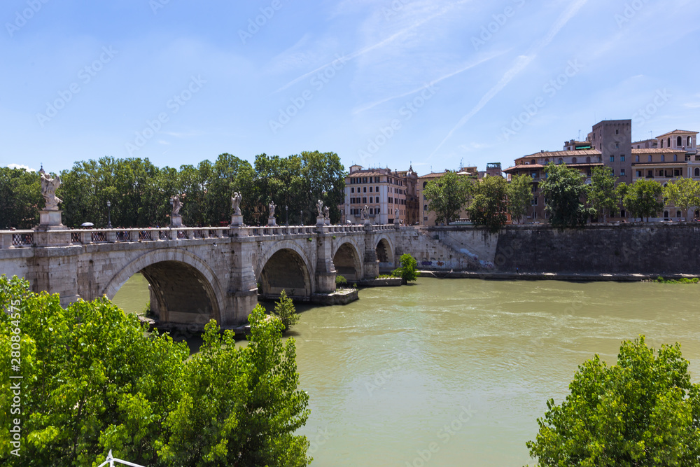 Rome Italy. View of famous Sant Angelo Bridge. River Tiber.