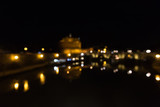 Blur night view of The Mausoleum of Hadrian, known as the Castel Sant Angelo in Rome, Italy.