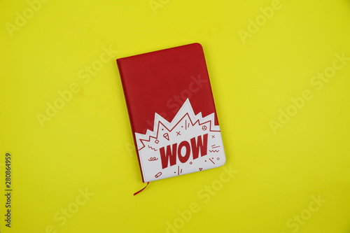 notebook on a yellow background