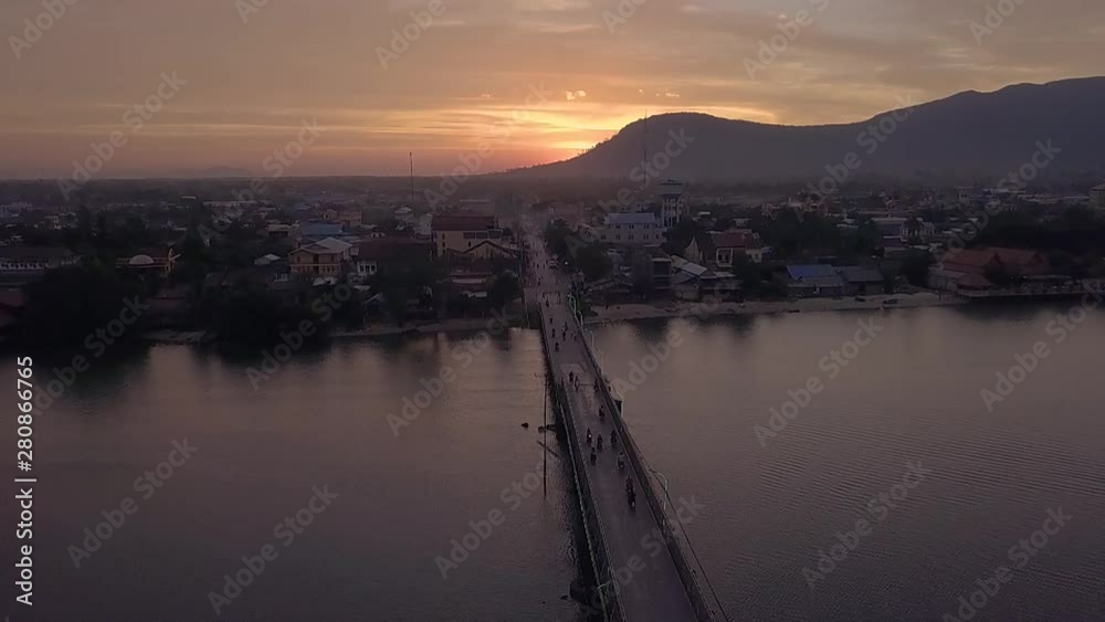 Aerial Shot of the Entanou Bridge and mountains on the Praek Tuek Chhu River in Kampot, Cambodia. Aerial Shot of the Entanou Bridge and mountains on the Praek Tuek Chhu River in Kampot, Cambodia.
