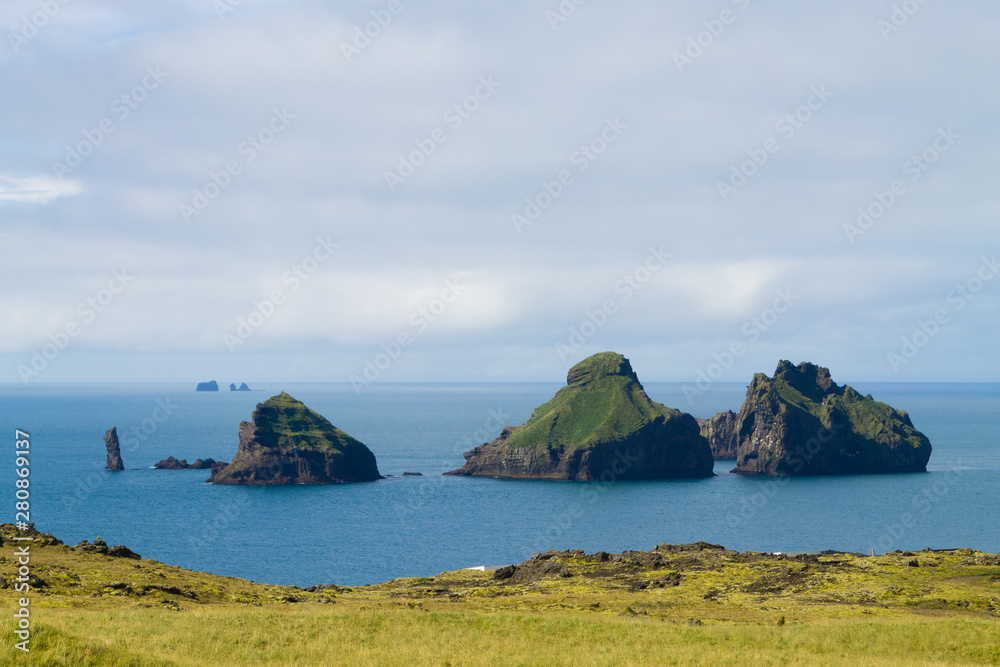 Fototapeta premium Westman Islands beach day view, Iceland landscape.Smaeyjar islands
