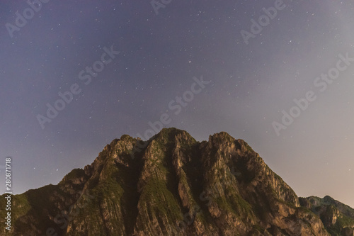 Wallpaper of starry sky with mountains for desktop