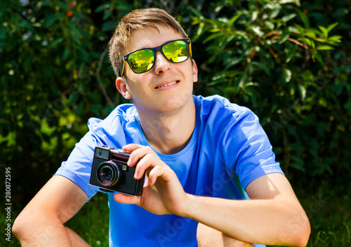 Young Man with a Camera photo