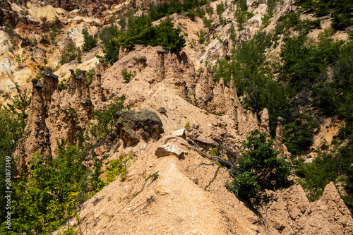 Devil's town (Djavolja Varos), Sandstone structures with stones on top. Interesting rock formations made by strong erosion on Radan mountain in Serbia. photo