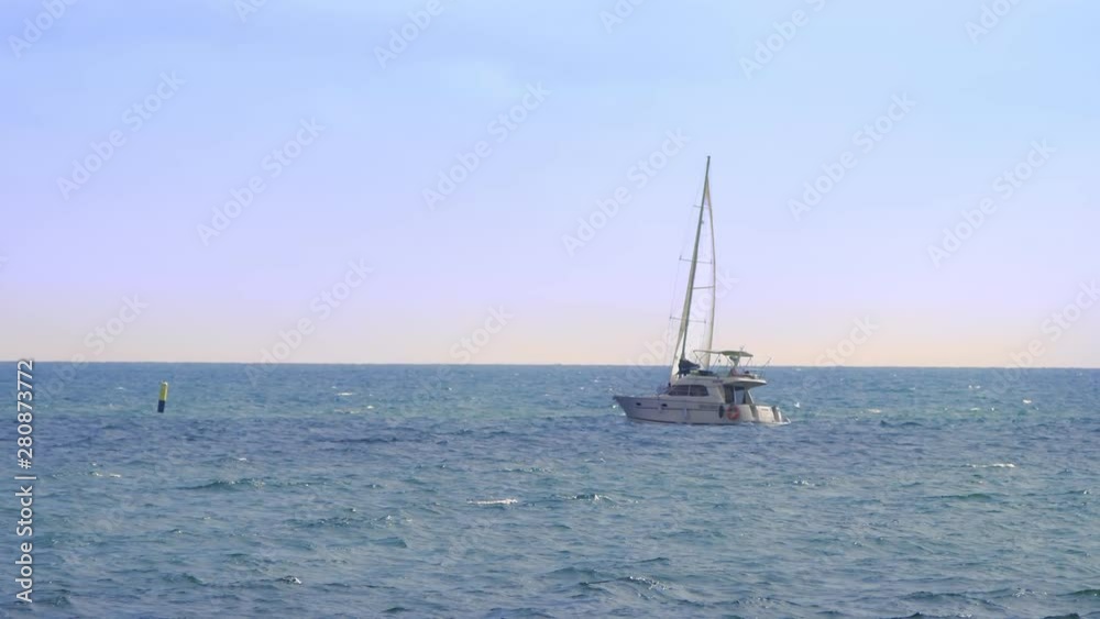 concept of water sports, summer fun. boats and sailing boats on the sea. concept of water sports, summer fun. boats and sailing boats on the sea.