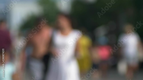 Wallpaper Mural blurred background. A crowd of unrecognizable people walking on a sunny summer day. Torontodigital.ca