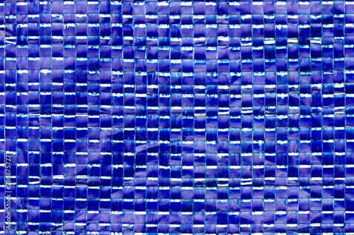 Texture of blue plastic net bag. Concept of recycle product or global warming.