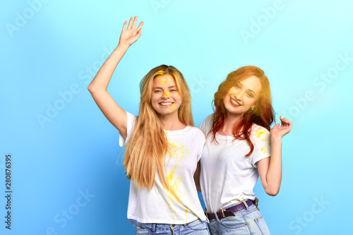 Canvas Print two happy girls celebraiting traditional indian spring holiday