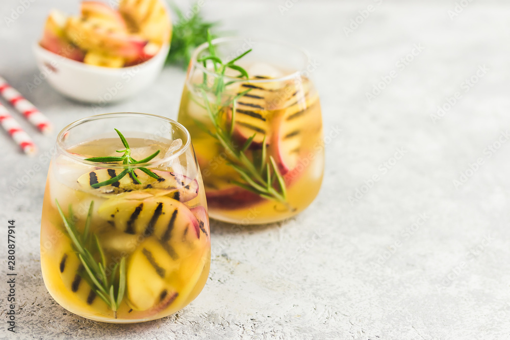 Cold brew nectarine iced tea. Selective focus, space for text. Cold brew nectarine iced tea. Selective focus, space for text.