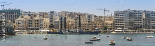 View of St julian s bay as seen from across the water at the Independence Gardens in Sliema in Malta