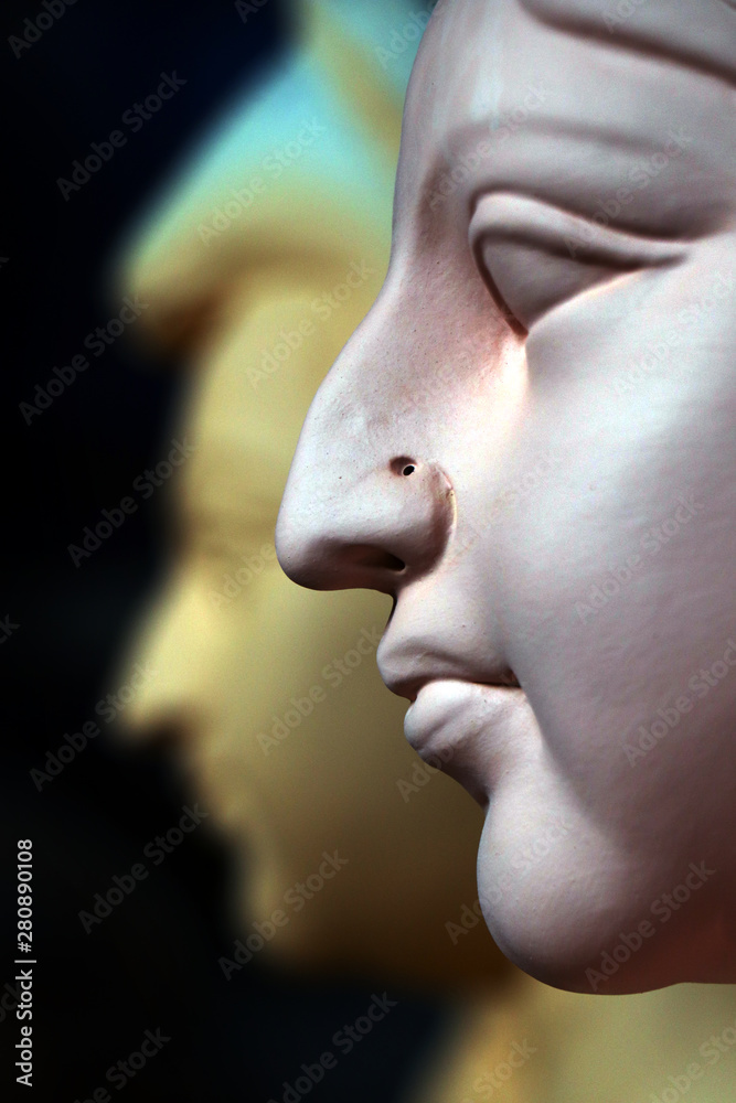 Idol of Hindu Goddess Durga during preparations in Kolkata. Clay idol of Goddess Durga, under preparation for Bengal's Durga Puja festival at Kumartuli Kolkata. Durga Puja is biggest festival in India