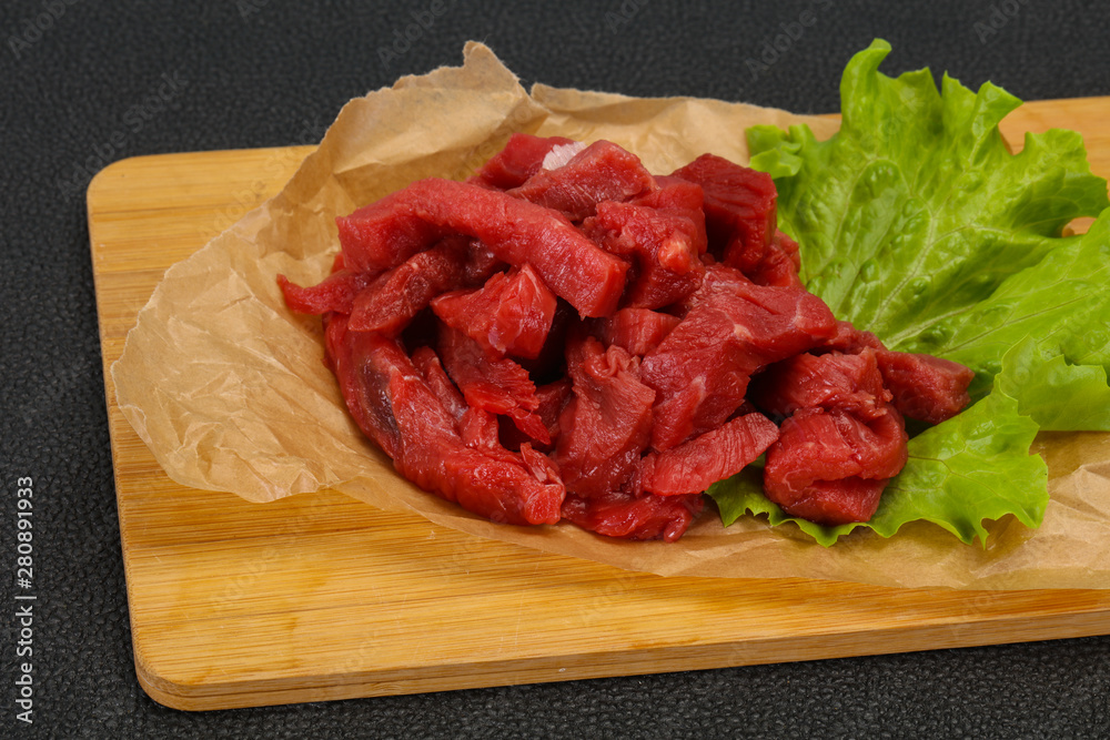 Raw beef meat sliced for cooking Raw beef meat sliced for cooking