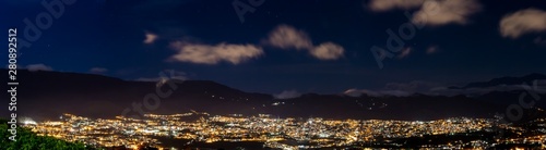 City panorama at night made with several pictures put together in software. This is San Cristobal in Venezuela during night. photo