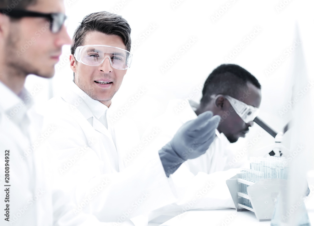 group of scientists are discussing new achievements group of scientists are discussing new achievements