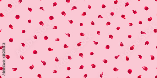 Pattern of red rose petals on a pink background