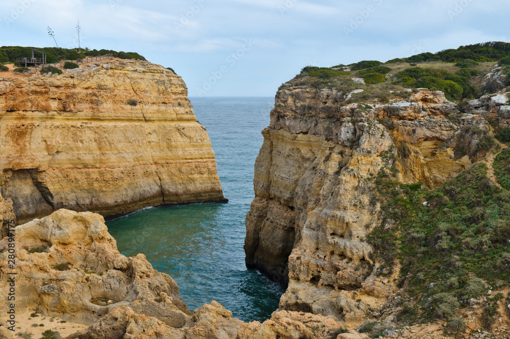 Cliff view and Atlantic ocean in Lagoa. Algarve, Portugal