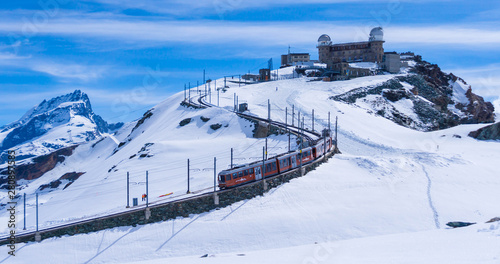 The Gornergrat bahn railway at zermatt which goes up to a station with a view of the matterhorn mountain
