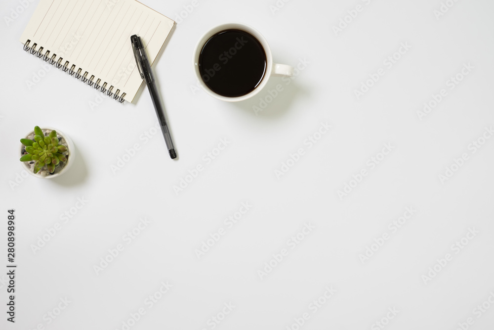 Flay lay, Top view office table desk with smartphone, keyboard, coffee, pencil, leaves with copy space background. Flay lay, Top view office table desk with smartphone, keyboard, coffee, pencil, leaves with copy space background.