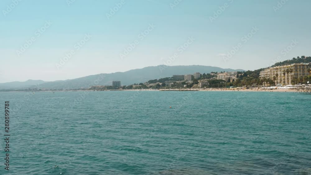 Unique view of Cannes from sea. Beach and mountains. Unique view of Cannes from sea. Beach and mountains.