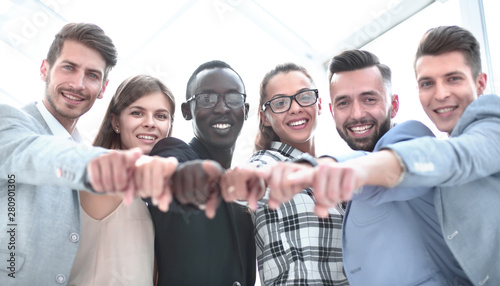 Portrait of excited young business people pointing at you © ASDF