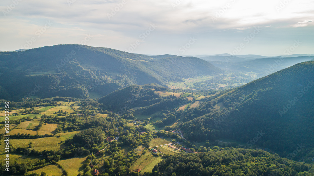Fototapeta premium Beautiful scenery. Fields, hills and valleys. Mountains, rocks, sky. 02