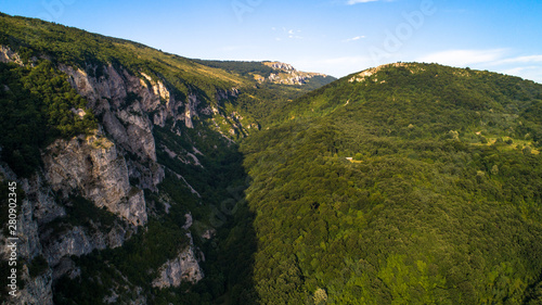 Beautiful scenery. Fields  hills and valleys. Mountains  rocks  sky. 01