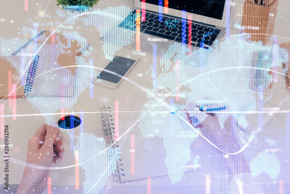 International business hologram over hands taking notes background. Concept of success. Multi exposure International business hologram over hands taking notes background. Concept of success. Multi exposure