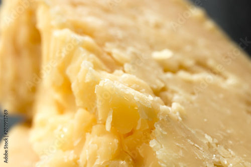 Cheese texture, closeup. Hard seasoned cheese structure in macro shot